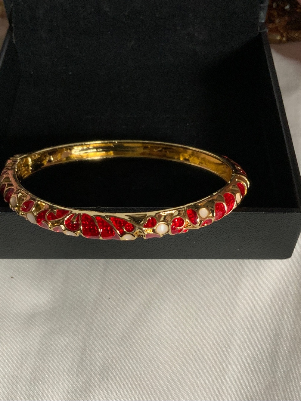 Gold-Tone Bangle Bracelet with Red Enamel and Pearl Accents